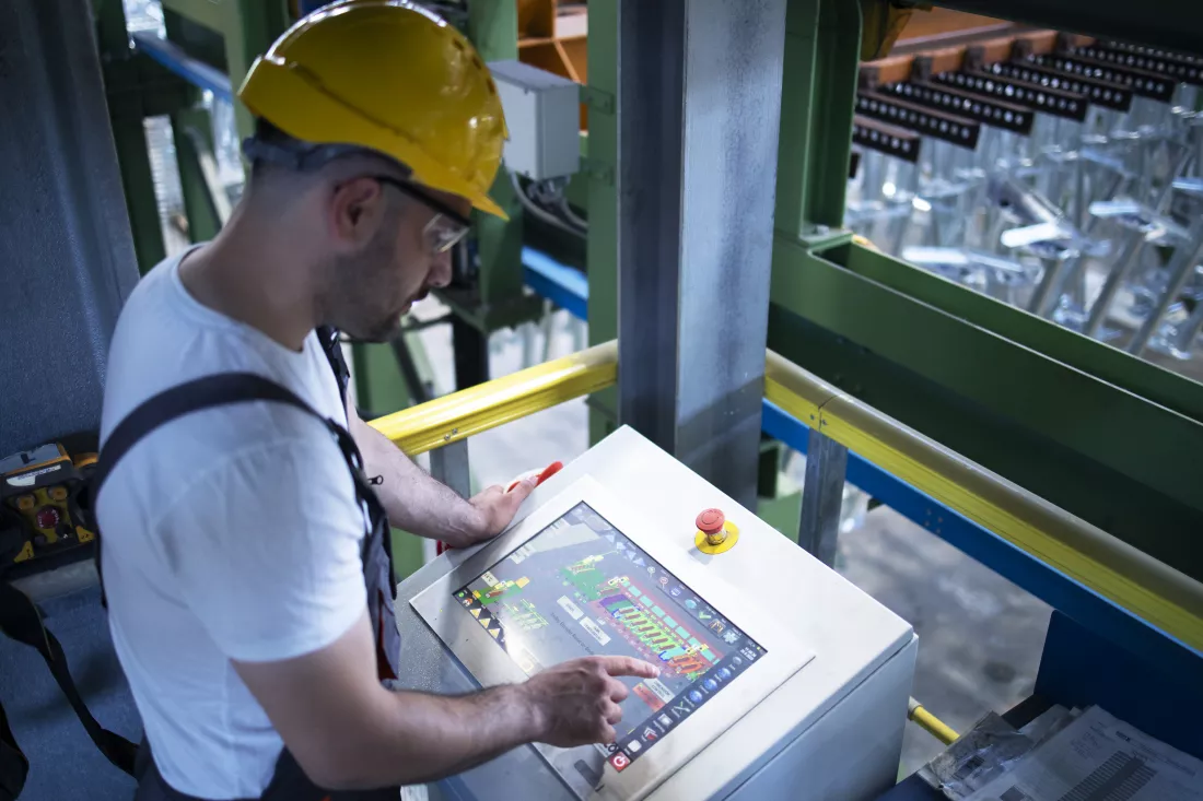 factory-worker-monitoring-industrial-machines-production-remotely-control-room