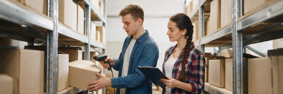 students-scanning-parcels-in-a-warehouse-test