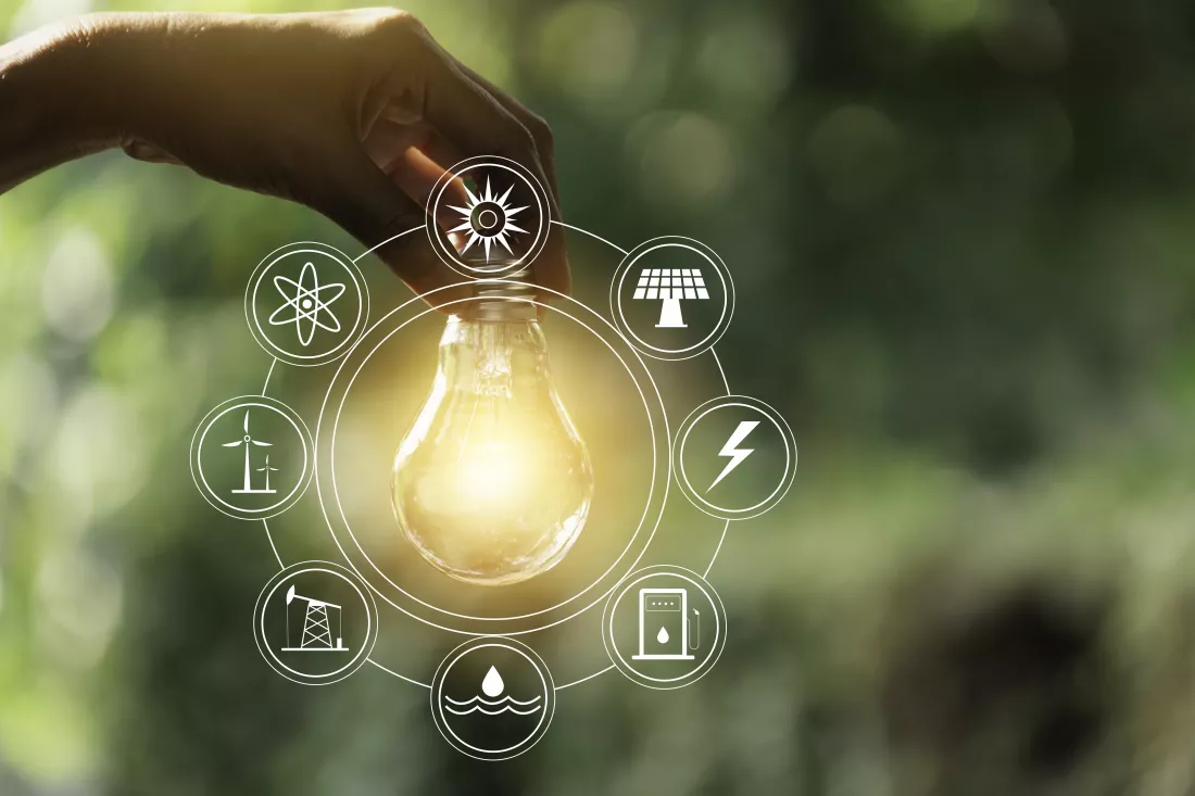 hand-male-holding-light-bulb-copy-space-energy