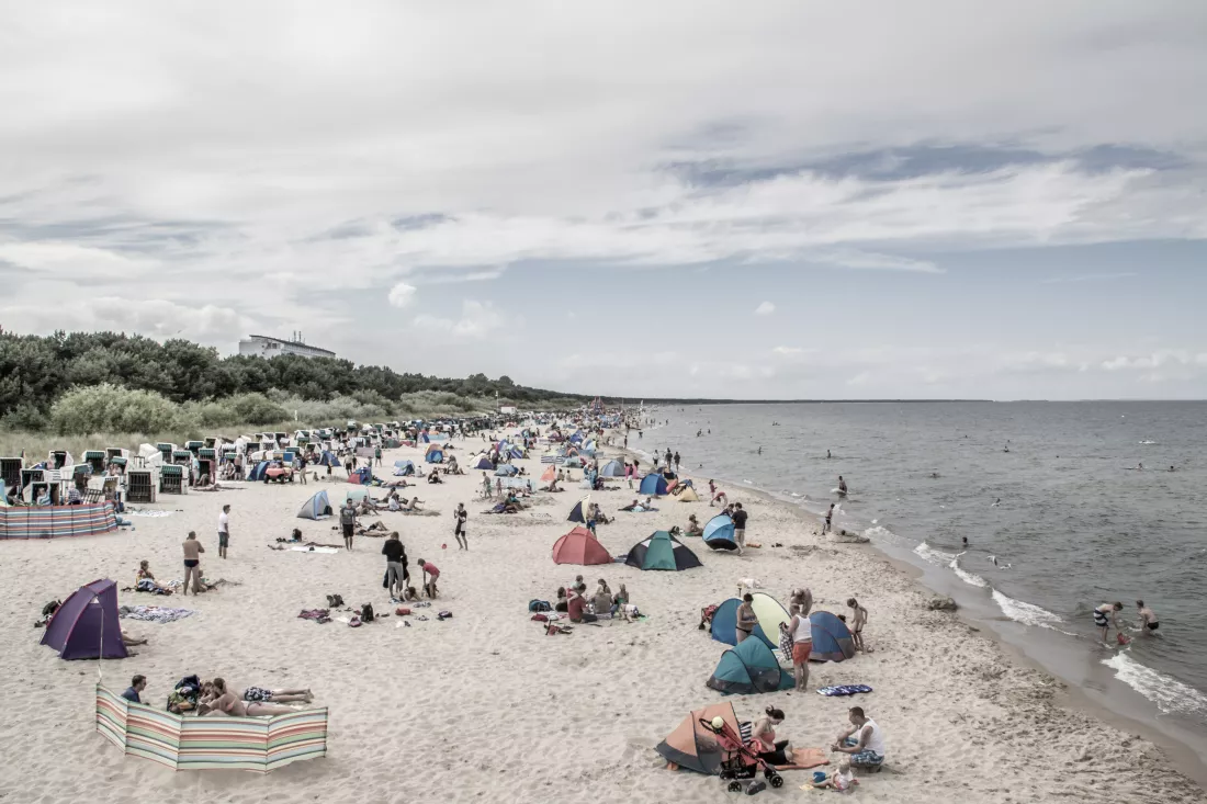 people-beach-against-sky