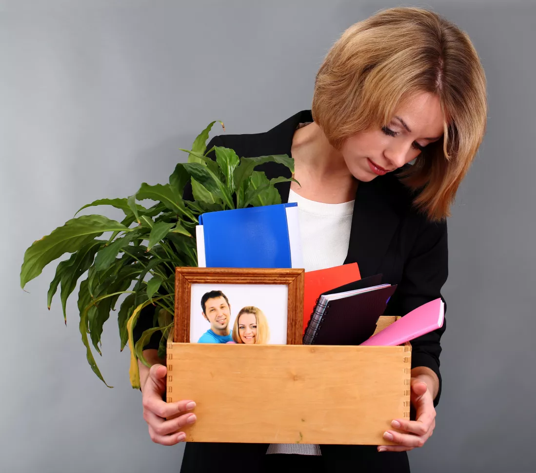 young-beautiful-woman-fired-from-her-job-grey-background