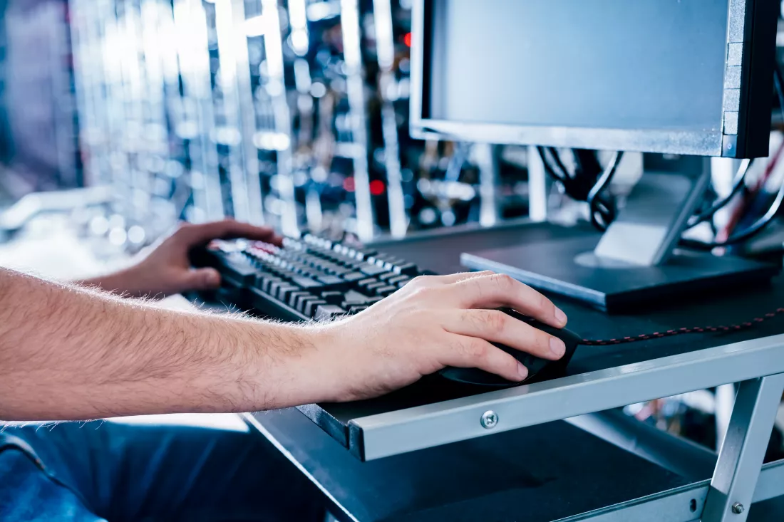 it-specialist-working-bitcoin-crypto-currency-mining-farm